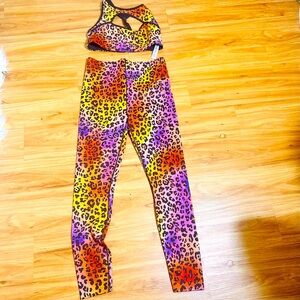 Savage Fenty colorful leopard print sports bra and compression leggings. L-XL